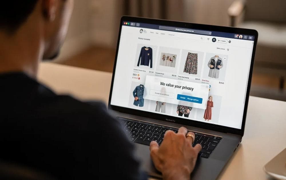 man on laptop shopping